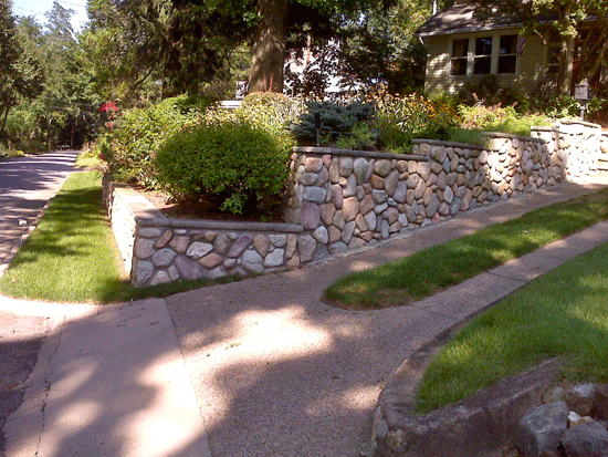 Masonry Retaining Wall Complimented with New Landscape